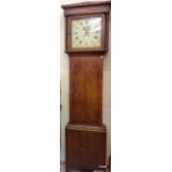 An oak cased 30 hour long cased clock with enamel dial with a makers name to the front Salisbury