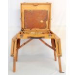 A vintage Windsor and Newton field Artist studio with folding legs and oil paints 45 x 40