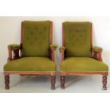 A pair of Edwardian button back fire side chairs