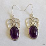 A pair of silver and amethyst Art Nouveau style earrings