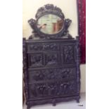 A black Lacquer Chinese utility cabinet with mirror back and Lotus design 210 inc 140 x 110 x 52