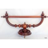 A vintage Mahogany towel rail with screw attachment for wall