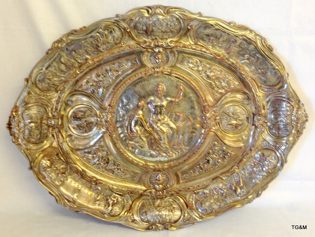 An Elkington and sons silver plated charger with an Exhibition 1876 tag to the rear 63 x 48cm