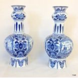 A pair of Delft blue and white onion vases 20cm