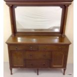 A large oak sideboard/dresser 2 over 2 drawers with 2 cupboards with full width bevelled edged