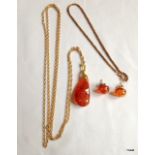 An amber necklace and matching earrings, on 14ct gold studs with a gold bracelet and chain