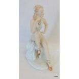 A Wallendorf china figure of a ballerina sitting at rest 21cm