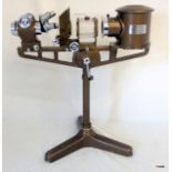 A Flatters and Garnett ltd microscope projector dated 1930