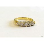 An 18ct gold 5 stone diamond ring approx 0.5cts size J