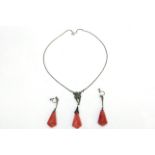 A set of coral and filigree earrings and necklace