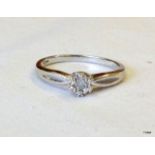 A 9ct white gold solitaire diamond ring size N