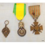 A French Medaille Militare 1870 with a 1914-17 Croix de Guerre and a Nationale des Combattants