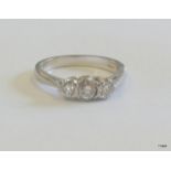 A 3 stone diamond and platinum ring approx 0.5ct size L/M