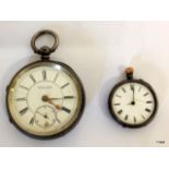 A pair of silver pocket watches