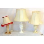 Three table lamps with shades