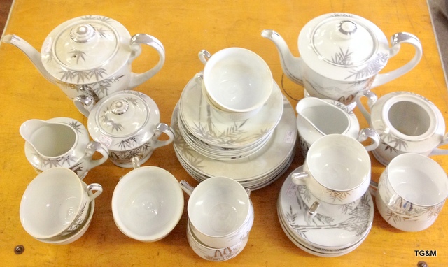 A quantity of Oriental design tea and coffee sets