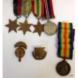 Military WW1 and WW2 medals and cap badges