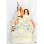 A 19th century Staffordshire figure of Scottish figures 37 x 20 x 8cm