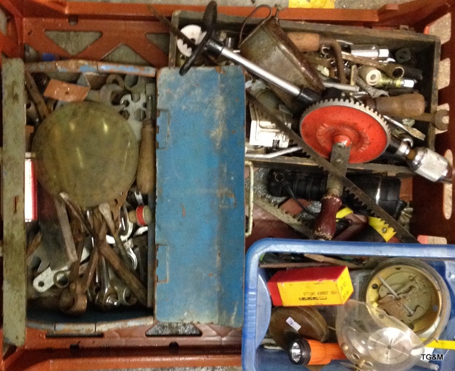 A tray of mixed workshop and DIY tools and materials