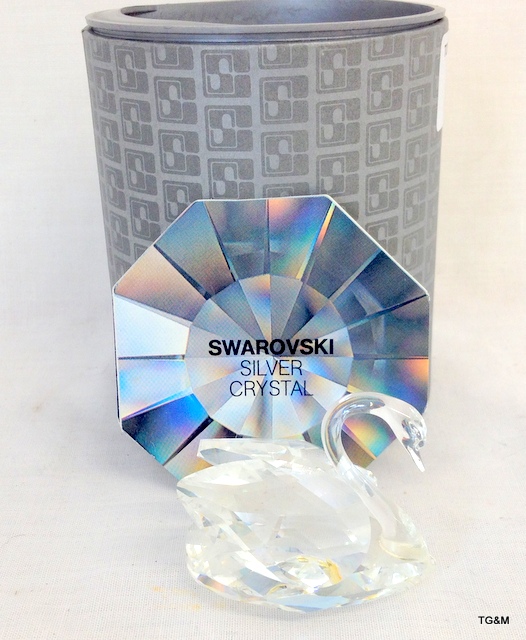 A boxed Swarovski crystal swan