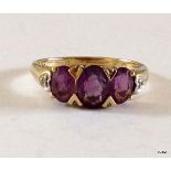 A 9ct gold amethyst and diamond ring hallmarked