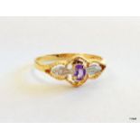 A 9ct gold amethyst and diamond shoulder ladies ring size Q