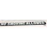 A cast no smoking sign