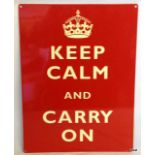 A metal keep calm and carry advertising sign