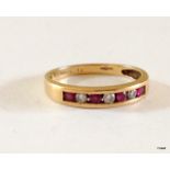 A 9ct gold diamond and garnet ring hallmarked size O