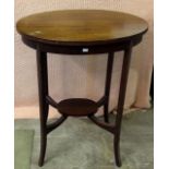 A mahogany inlaid oval lamp table