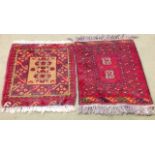 A pair of red hall door carpets 65 x 50