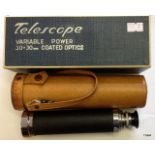 A tower variable power telescope with leather case new in its box