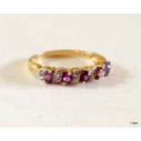 A 9ct gold diamond and amethyst ring with hallmarks size N