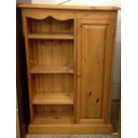 A pine bookcase cabinet