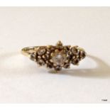 A 9ct gold cluster ring size O