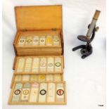 A students microscope and selection of Victorian sample slides