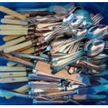 A collection of silver plate flatware