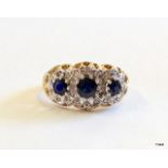 A 9ct gold ladies diamond and sapphire ring size L