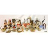 A collection of national dolls, oriental figures, various brass items etc