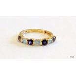 A 9ct gold Tanzanite and aquamarine ladies ring size J