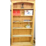 A five shelf pine bookcase