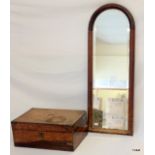 A walnut with brass writing slope/box and an arch topped bevel edged wall mirror