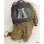 A babies enclosed gas mask