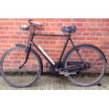 A vintage Raleigh gents bicycle with working Dynamo lights