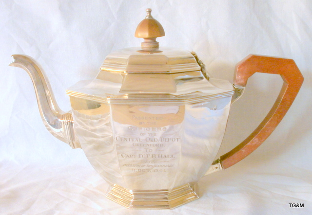 A silver hallmarked Tea pot with a military inscription dating 1941