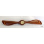 A vintage aeroplane propeller laminated wooden clock 64cm long