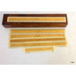 A boxed set of ivory/bone and beech rulers by B.J.Hall and Co