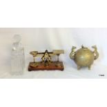 A pair of cut glass decanters, a set of postal scales with weights and an Oriental brass incense