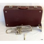 A 'Selmer' Bundy trumpet in its velvet lined case