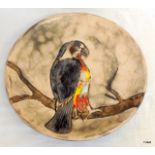 A German Art Pottery charger depicting a Parrot 36cm diameter
